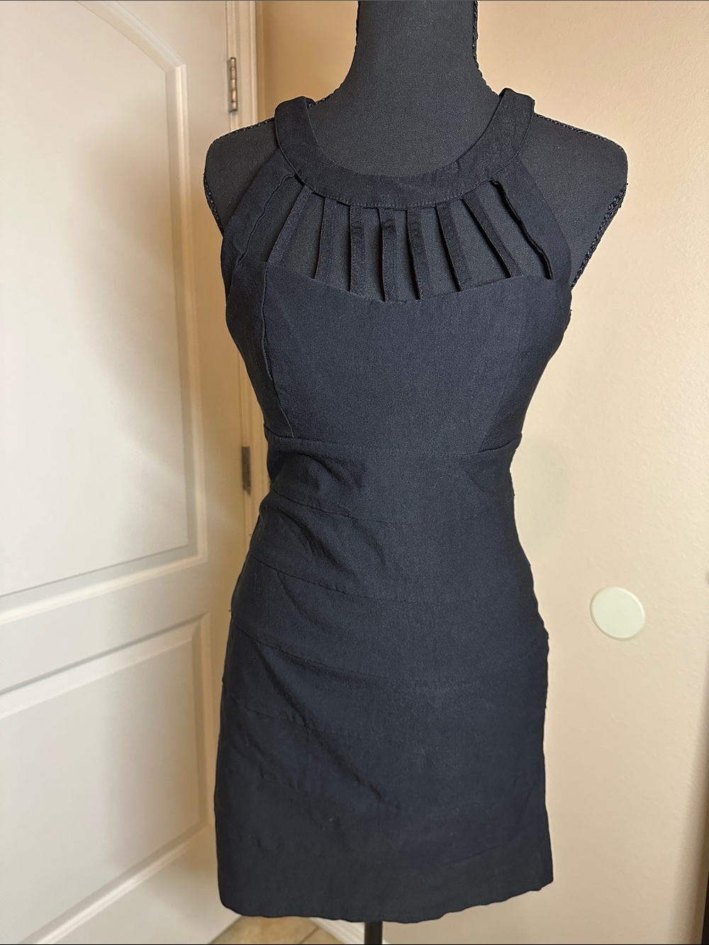 Black Sleeveless Mini Dress with Pleated Cutout Neckline